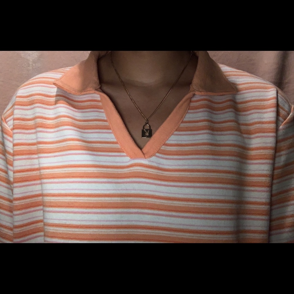 White and orange stripped shirt